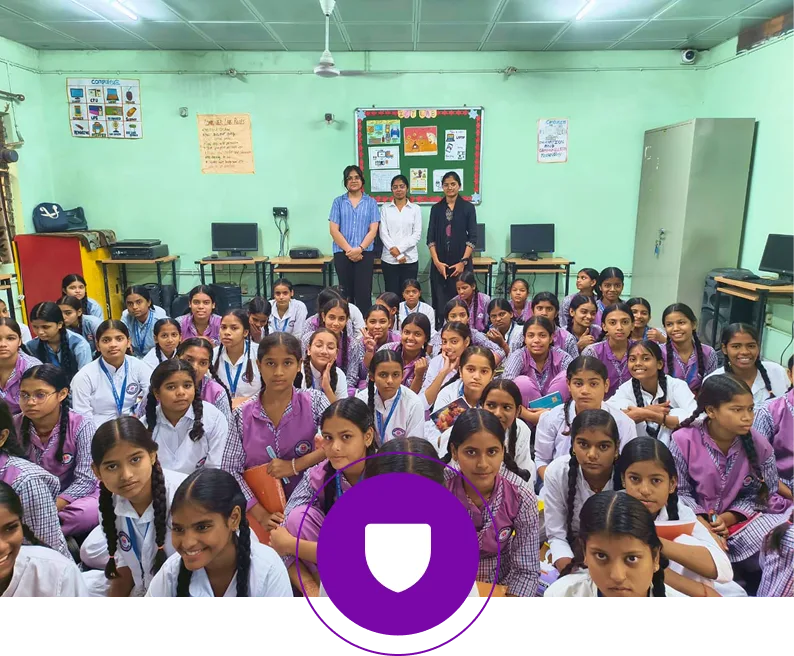 renu, sama and divya mehara teaching a group of school students about cybercrime.